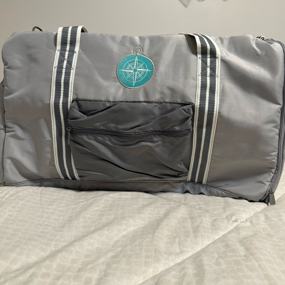 Thirty-One Travel Duffle in Whisper Grey. New. Never been used.
